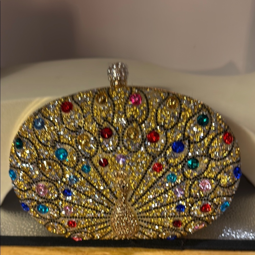 Gold and Red Ornate Clutch with Gemstone Embellishments​